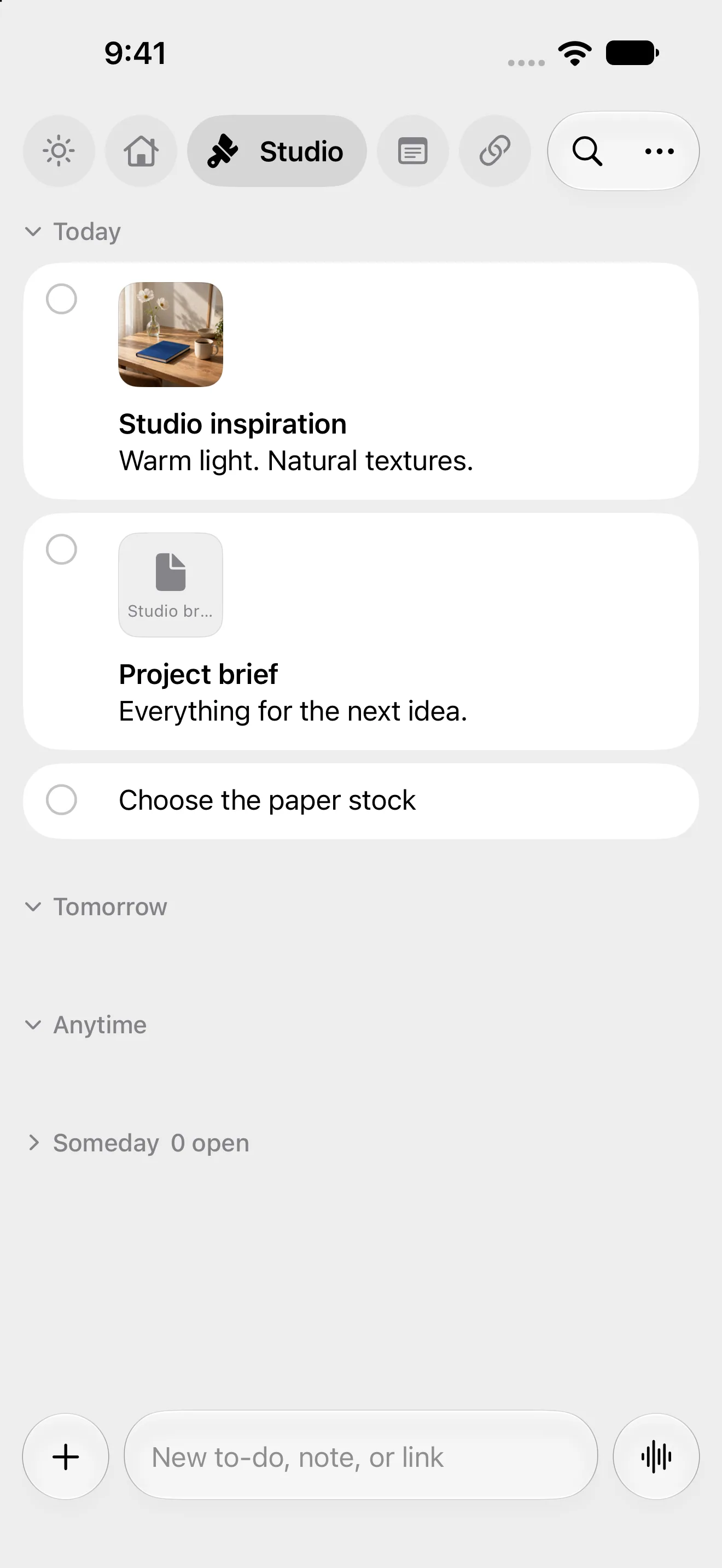 A Slate board holding a photo and a PDF alongside to-do items.